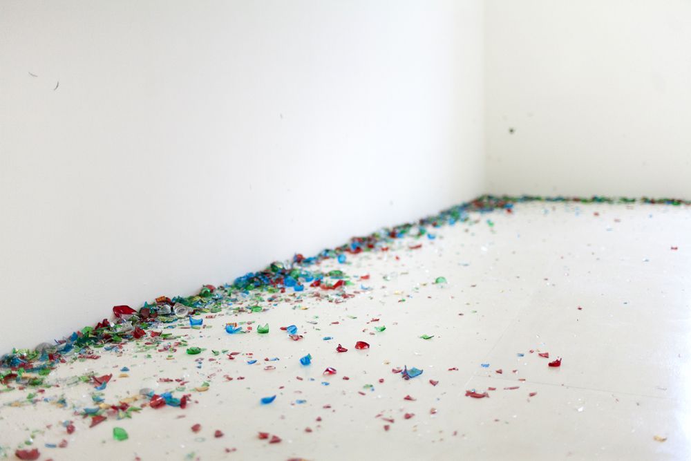 Latifa Echakhch's "Erratum," created by smashing Moroccan tea glasses against the gallery wall.<br/>